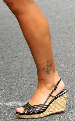 When she stepped out to run errands we noticed Winnie the Pooh on her ankle