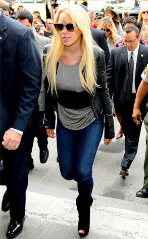 The Perp: Lindsay Lohan, dressed down in skinny jeans and a black leather 