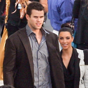 Kim Kardashian and Kris Humphries in photo together candid smiling