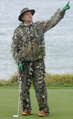  fellow golfers alike by donning a camouflage ghillie suit on the green
