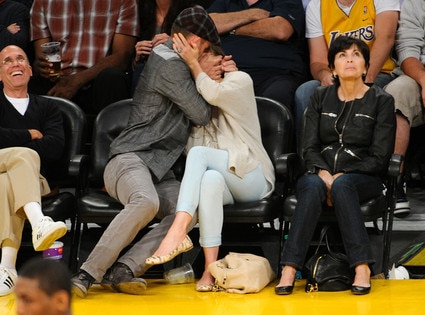 But Saturday at the LA Lakers game the engaged duo packed on some serious 