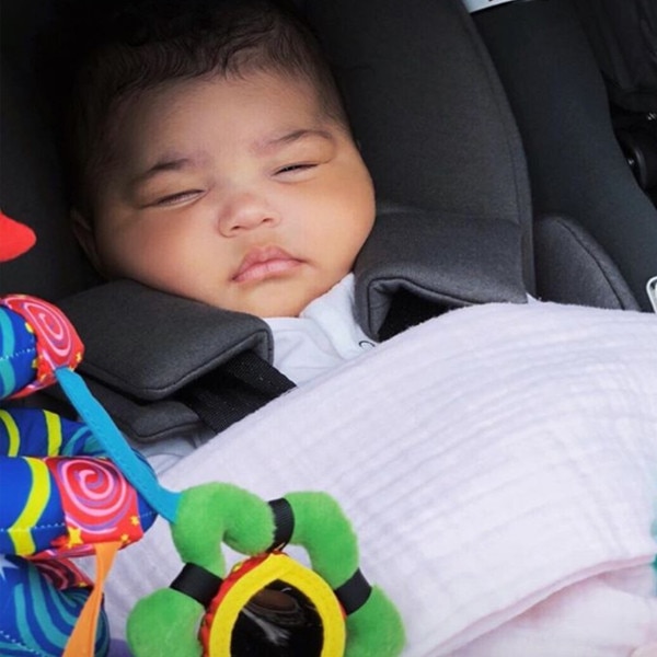 Kylie Jenner Takes ''Sleepy'' Baby Stormi on a Walk With Travis Scott