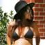 Kourtney Kardashian enceinte montre son ventre rond dans un bikini noir : découvrez la photo !