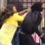 Mom beats child for throwing rocks at Baltimore Police