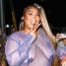 Lizzo, purple gown, barefoot