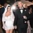Travis Barker Kisses Kourtney Kardashian's Foot in New Wedding Photos